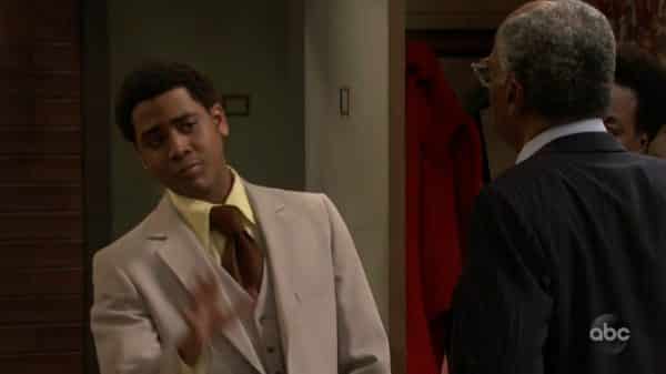 Jimmy Pearson (Jharrel Jerome) looking at Fred Davis in a judgemental way.