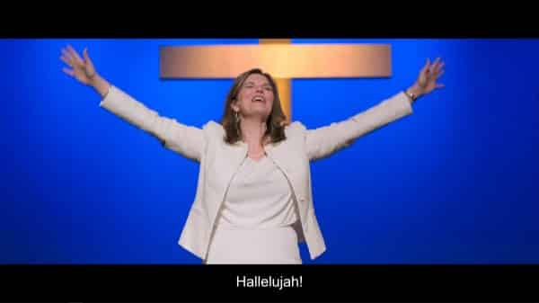 Pastor Helen (Jeanne Tripplehorn) shouting Hallelujah. 