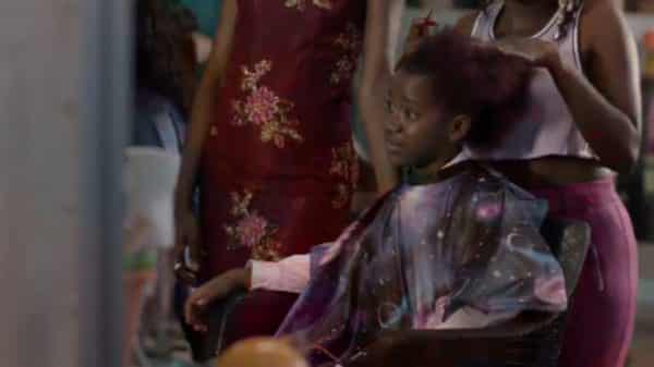 Jasmine (Camryn Jones) getting her hair done.