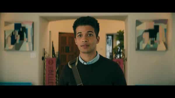 John Ambrose (Jordan Fisher) seeing Lara Jean for the first time in years.