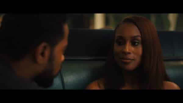 Mae (Issa Rae) on a date with Mike.