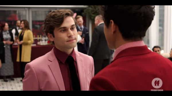 Sam (Jake Borelli) in a pink suit.