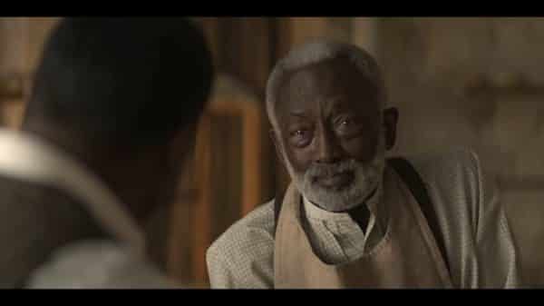 Cleophus (Garrett Morris) talking to his son.