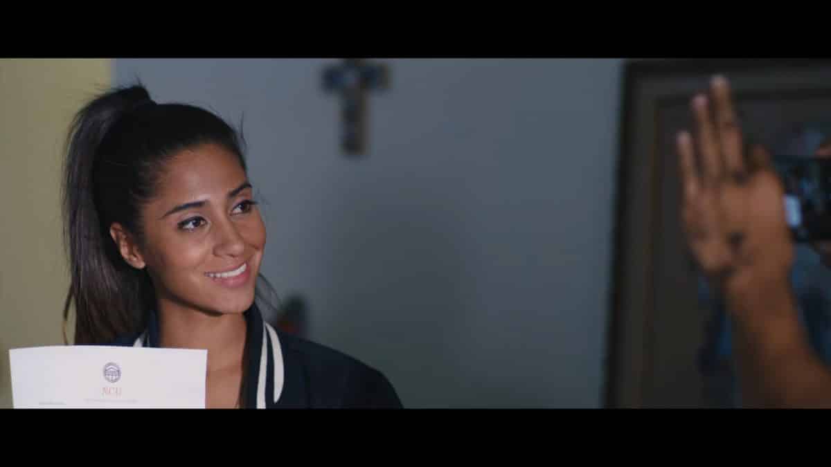 Marcella (Natalia Dominguez) smiling.