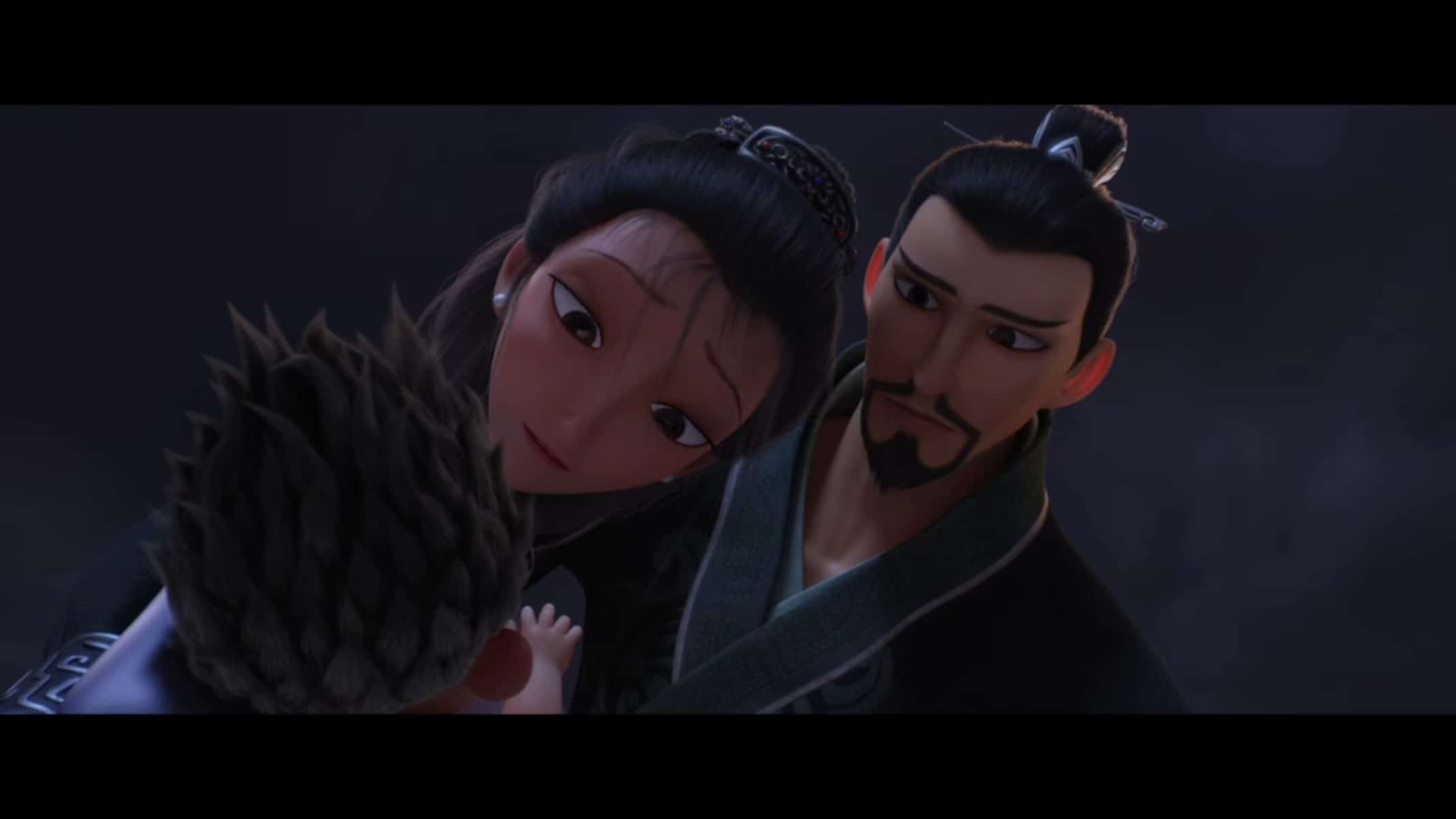 Lady Yi (Qi Lu) and Lord Yi (Hao Chen) looking at their child.