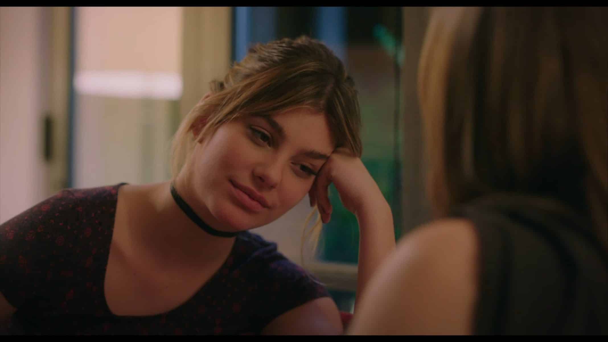 Ruby (Camila Morrone) listening to her mom tell her a story.