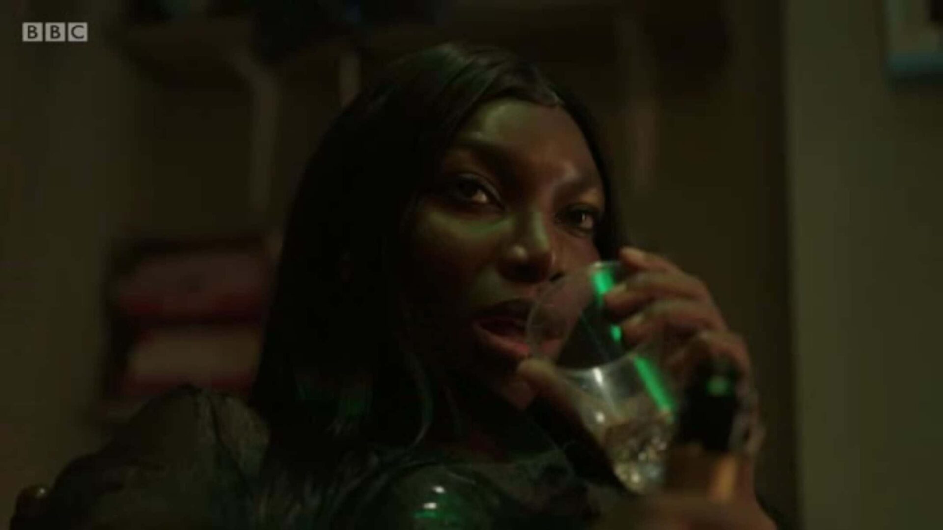 Arabella (Michaela Coel) taking a drink of water - I May Destroy You