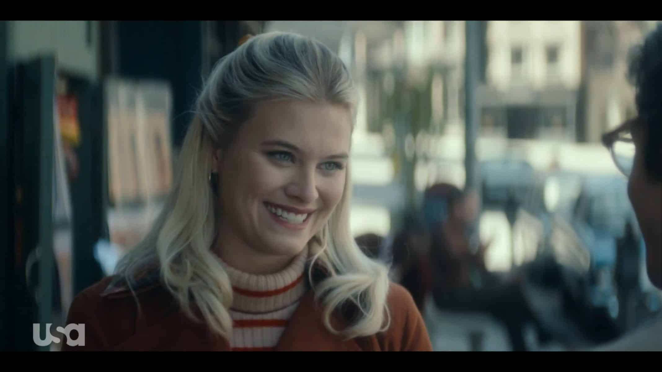 Young Betty (Tiera Dyck-Skovbye) smiling on a date.