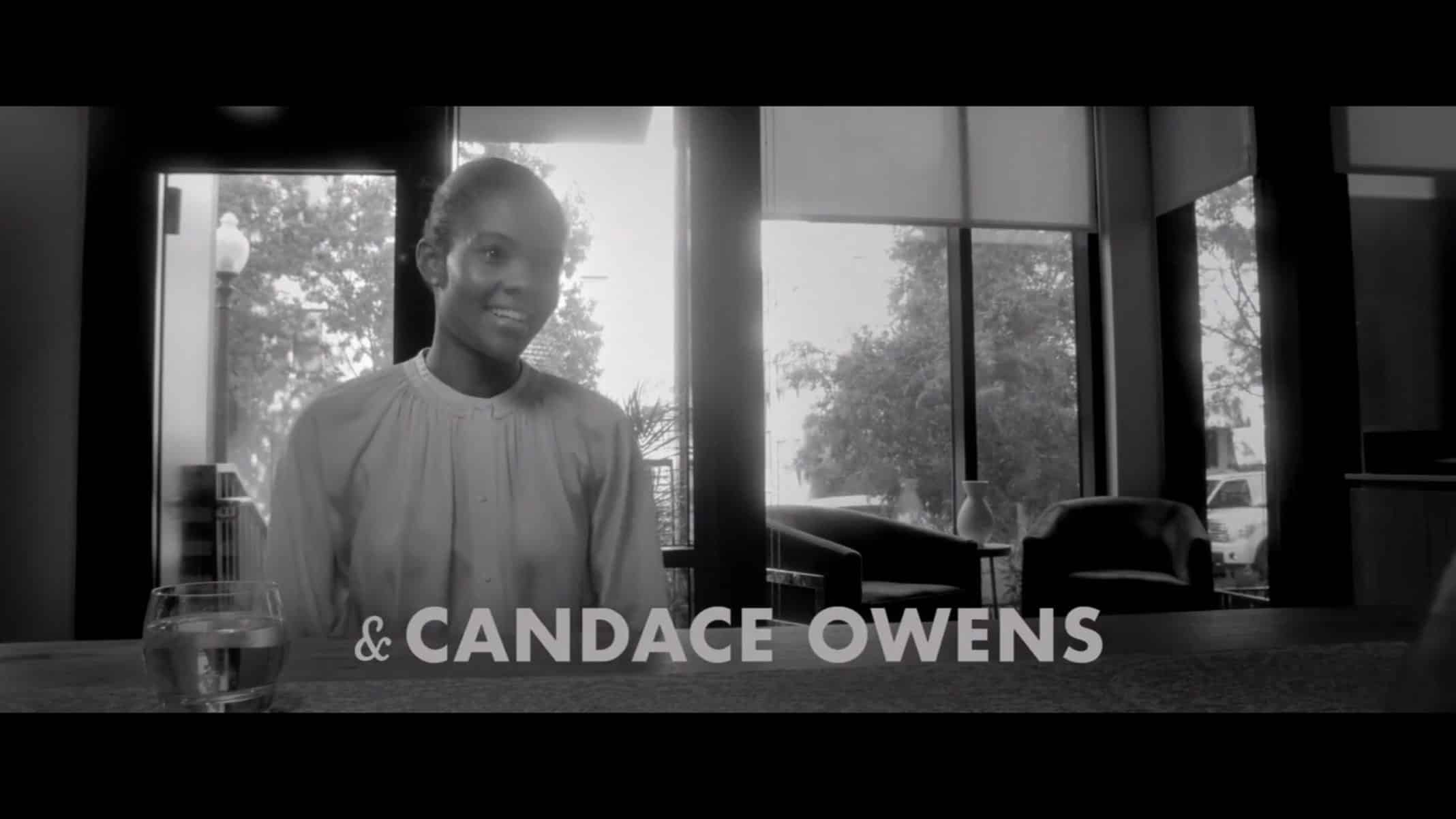 Candace Owens smiling and being interviewed.