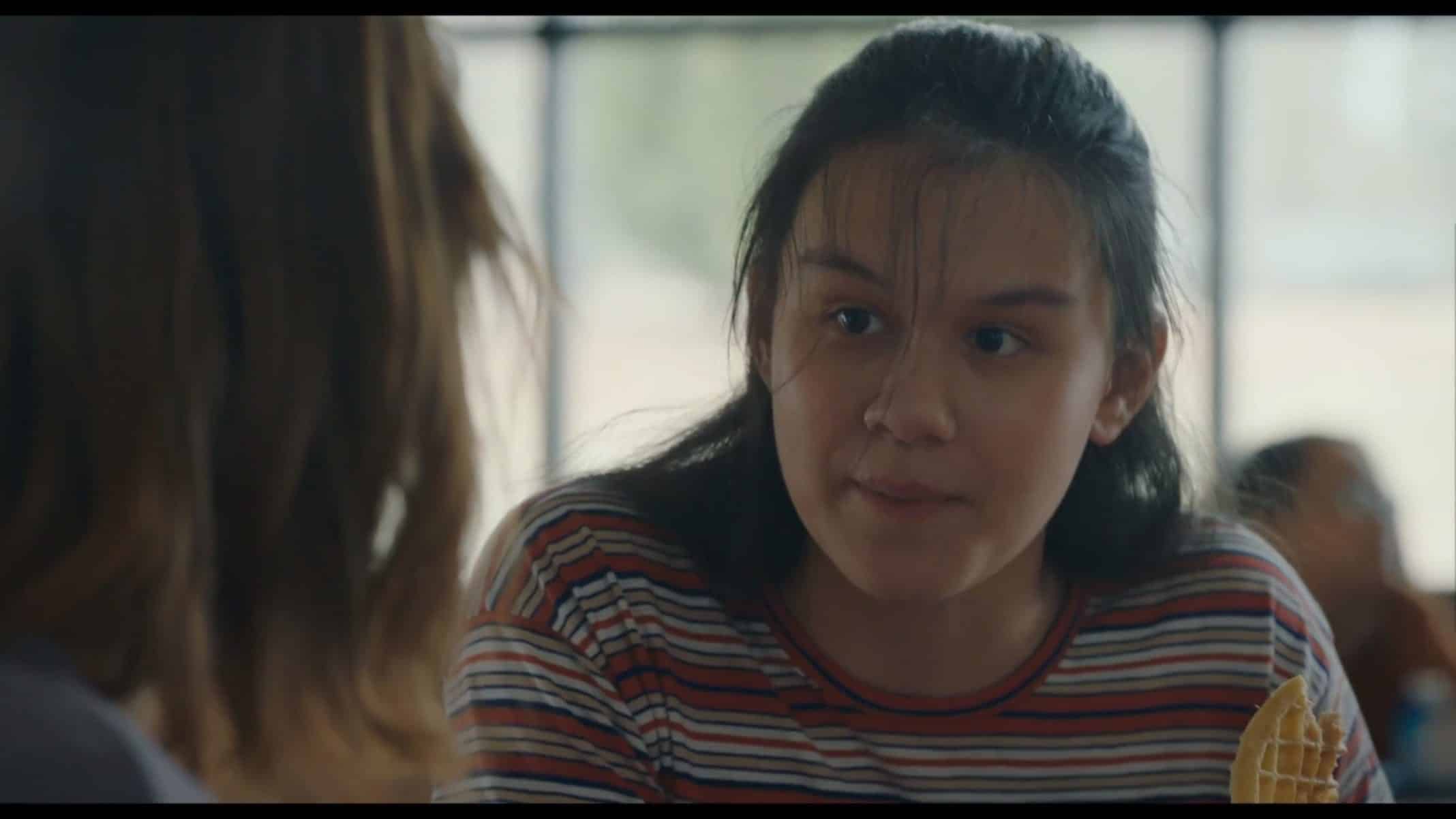 Glue Girl (Gabriella Garcia) talking to Alice.