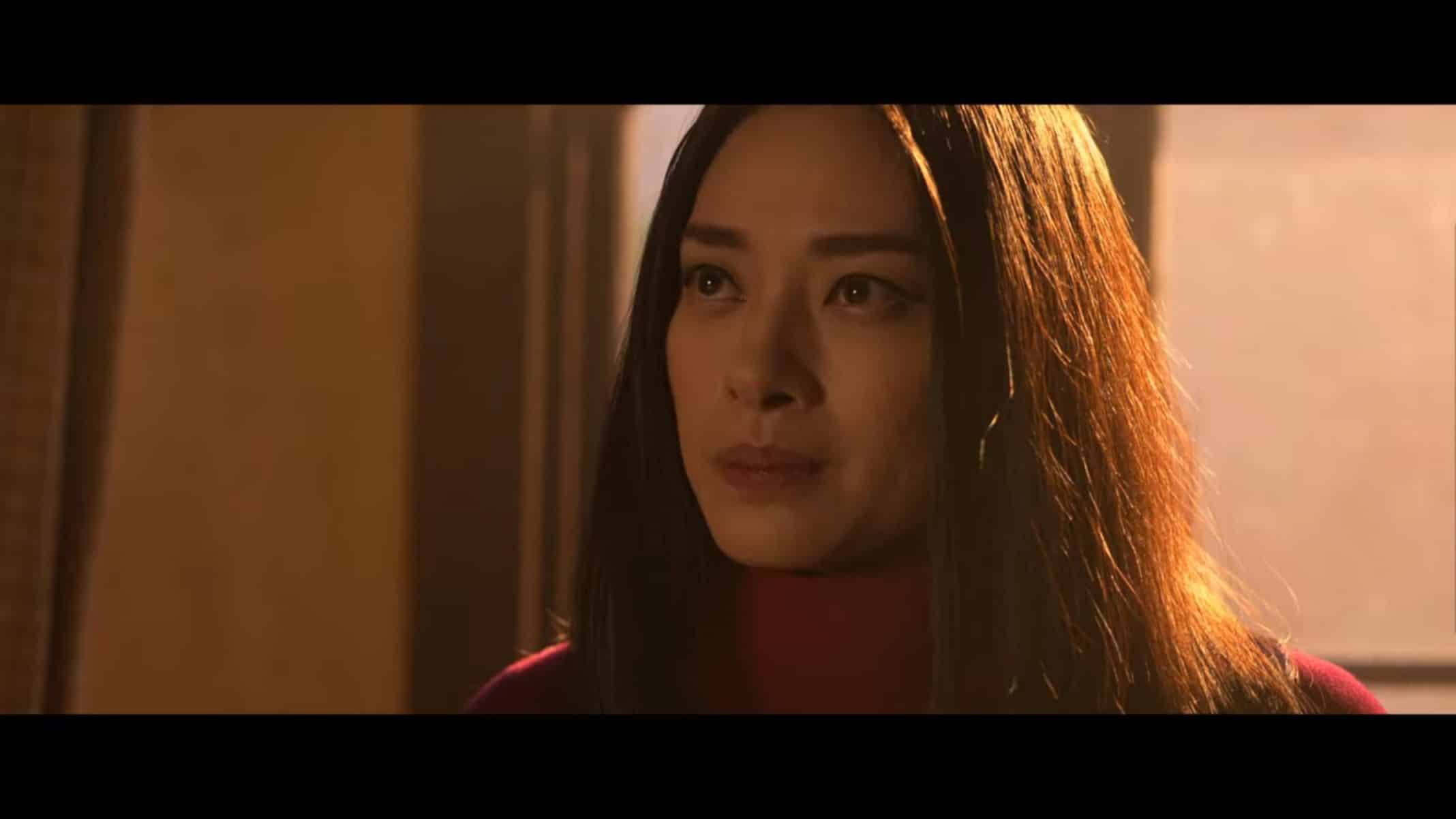 Quynh (Van Veronica Ngo) talking to Booker in his room.