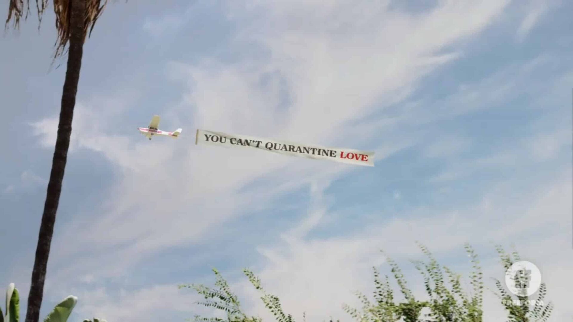 A Banner In The Sky saying you can't quarantine love.