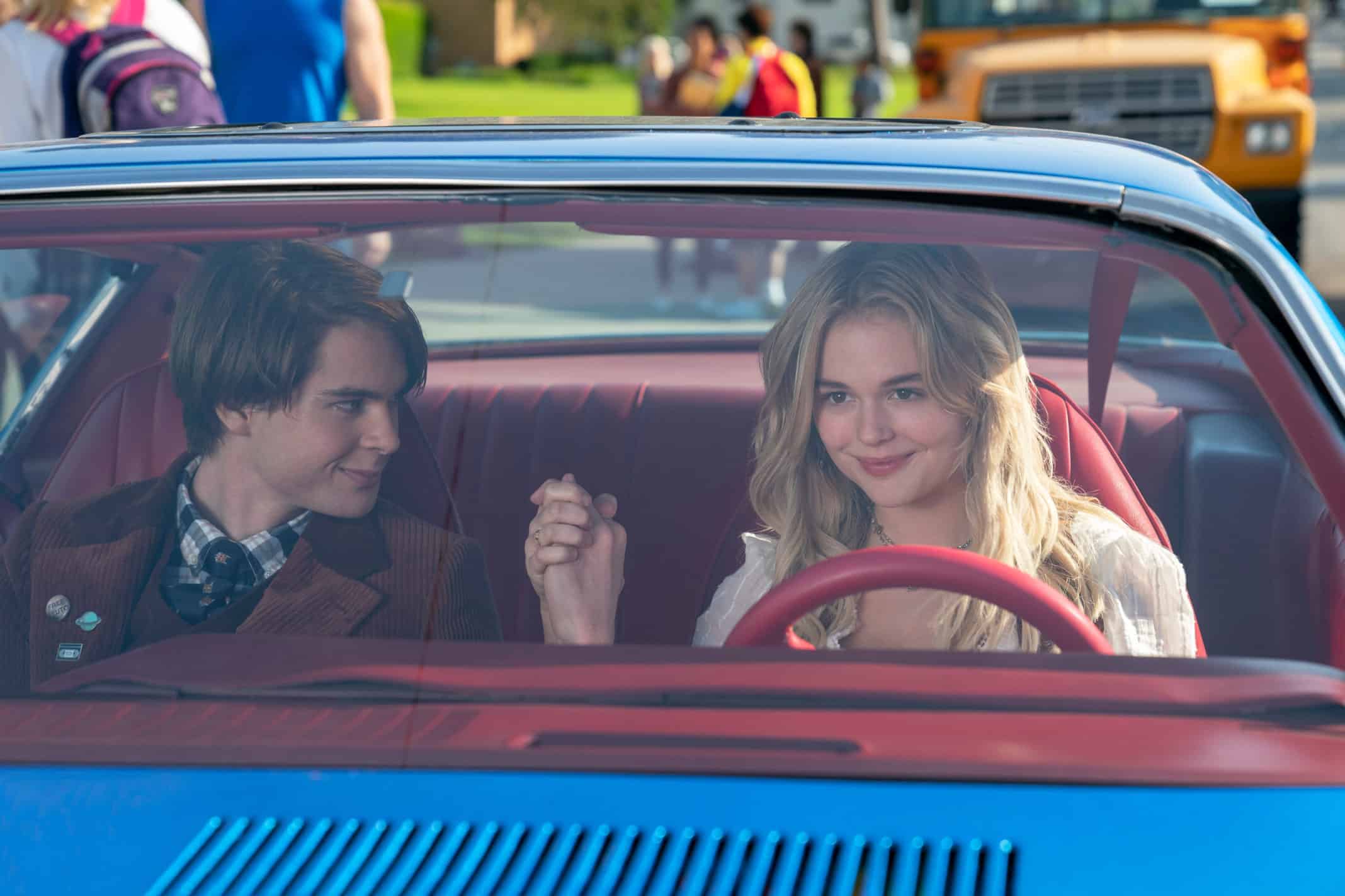 JUDAH LEWIS as COLE and EMILY ALYN LIND as MELANIE in Melanie's dad's car.