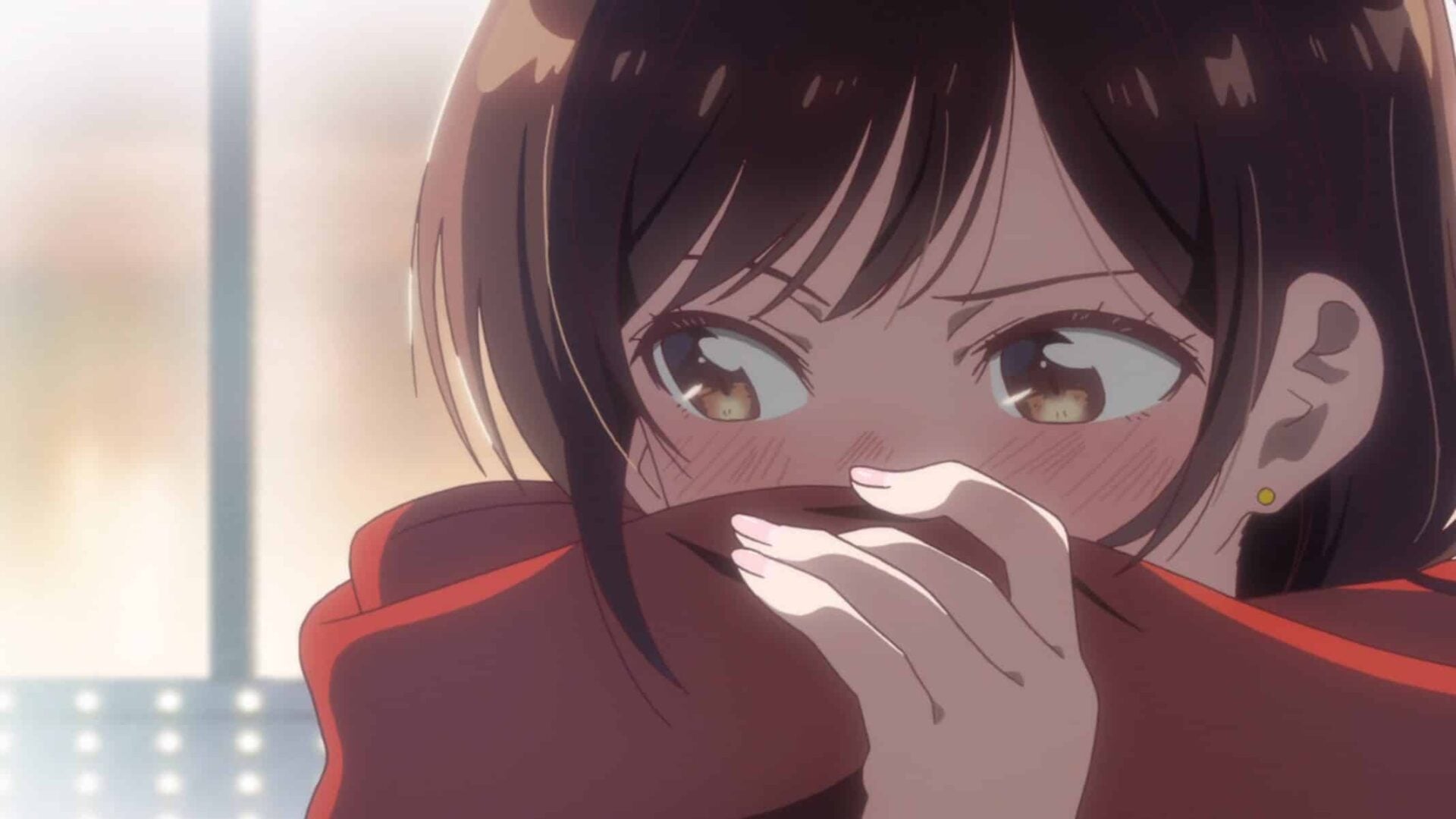 Mizuhara covering her face with a scarf.