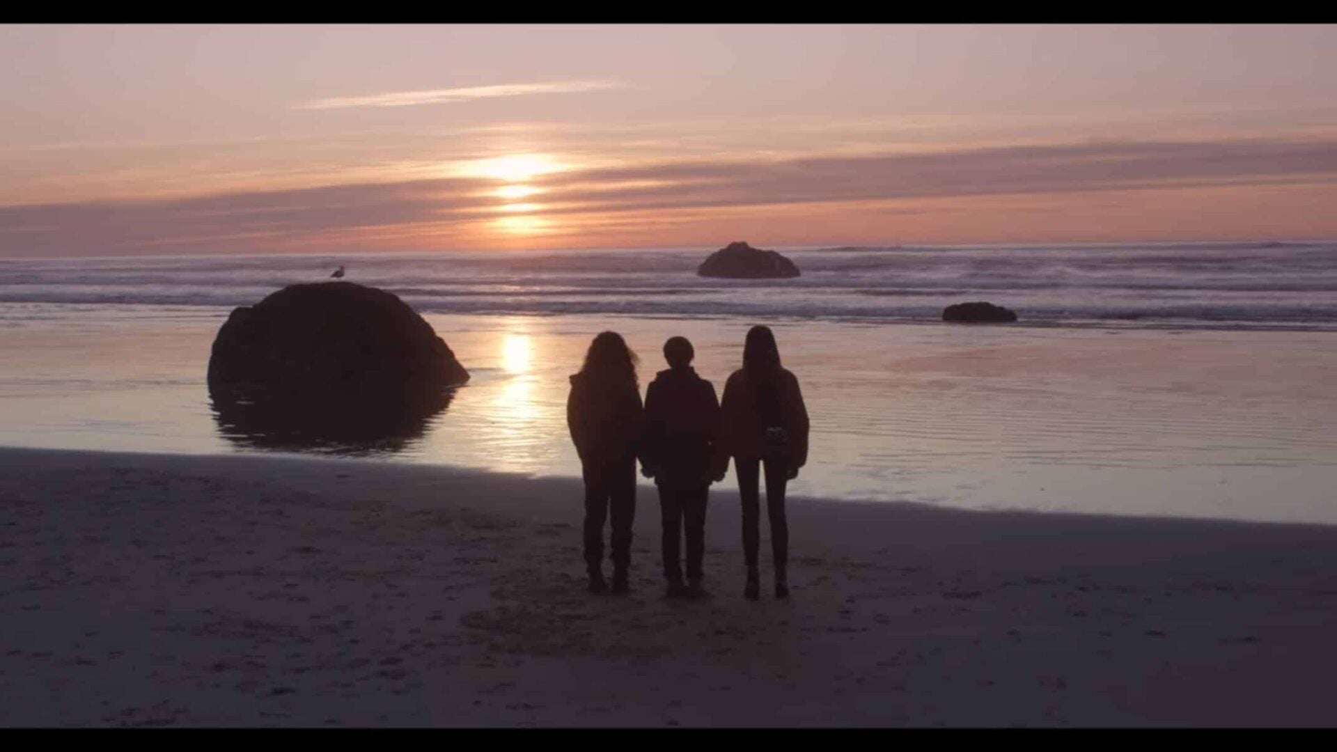 Moe, Elodie, and Tabitha at the beach.