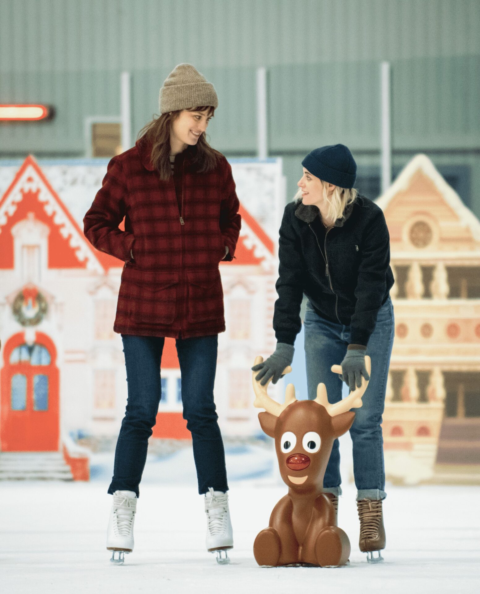 Abby (KRISTEN STEWART, right) and Harper (MACKENZIE DAVIS) enjoy a moment on the ice