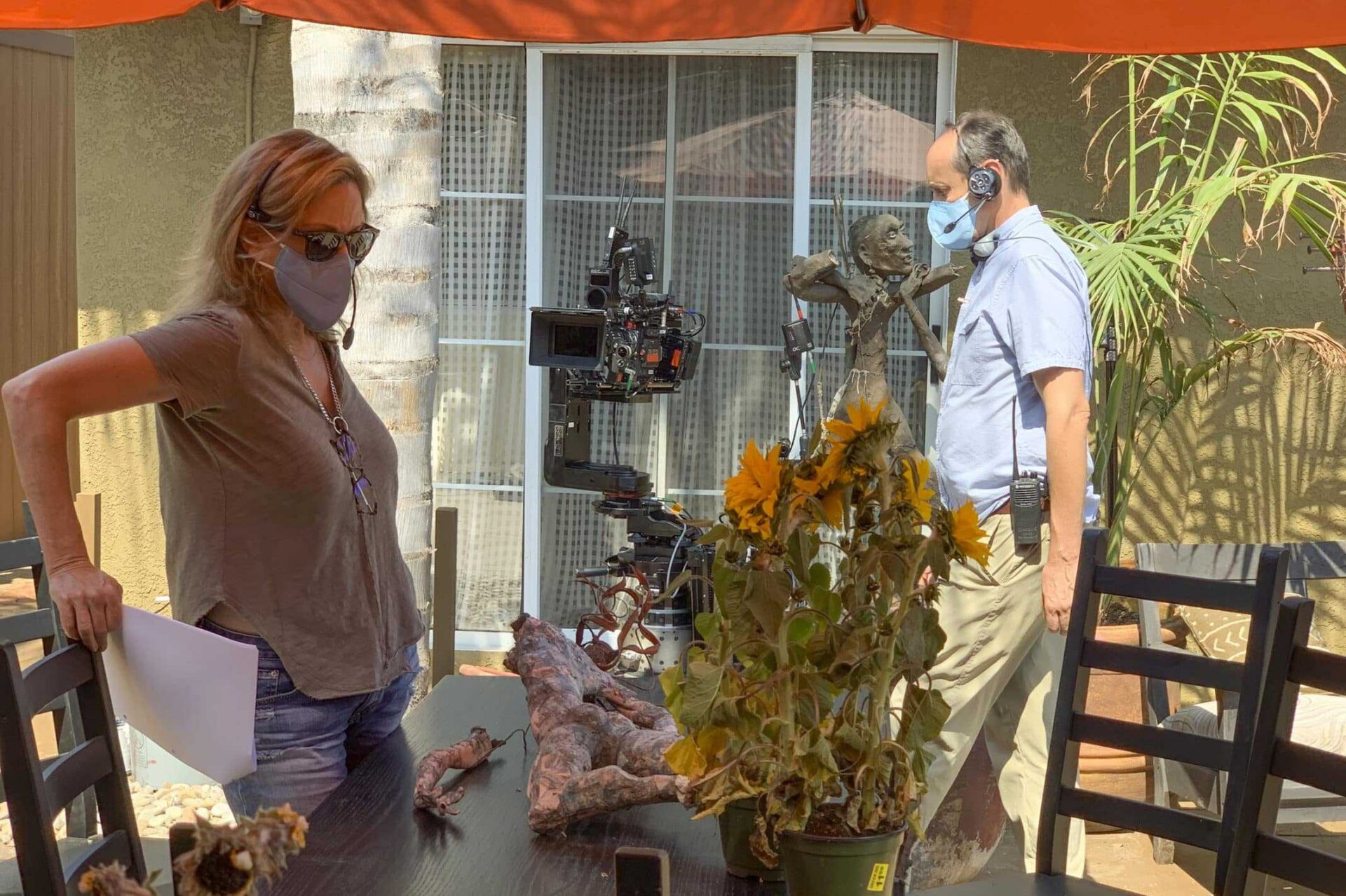 Joanna Johnson and Marco Farnoli on the Love In The Time of Corona set.