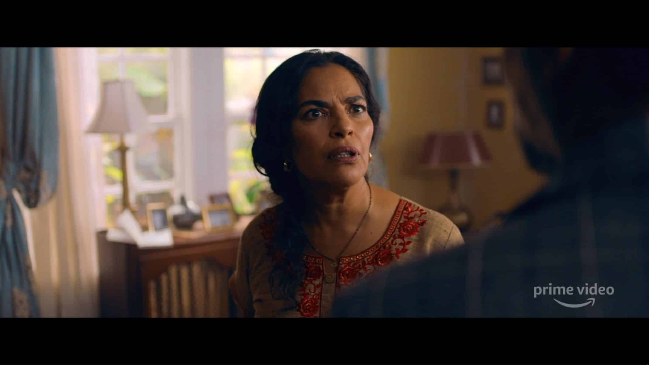 Usha (Sarita Choudhury) talking to her partner.