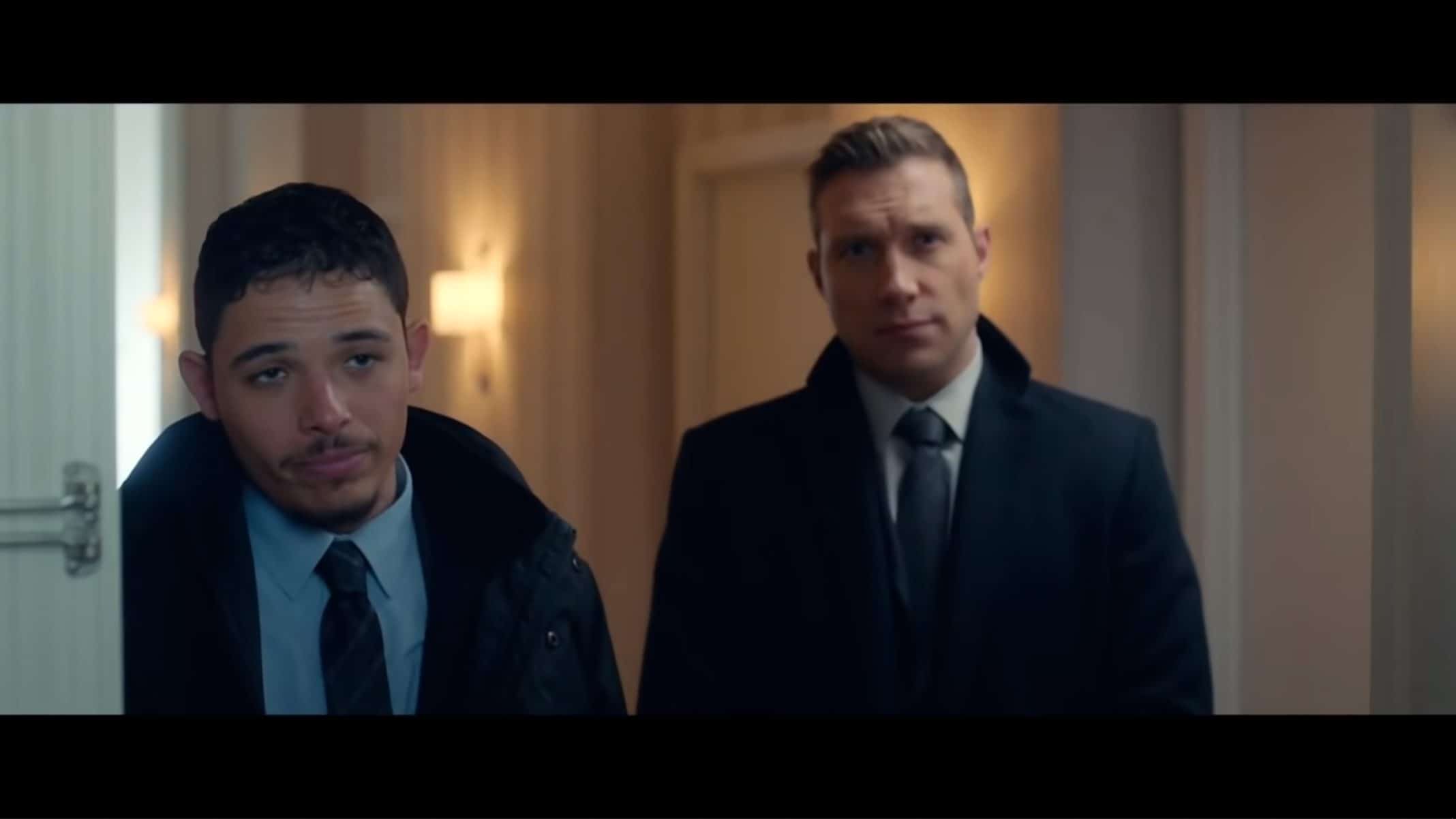 Agent Hall (Anthony Ramos) and Agent Nivens (Jai Courtney) meeting Tom.