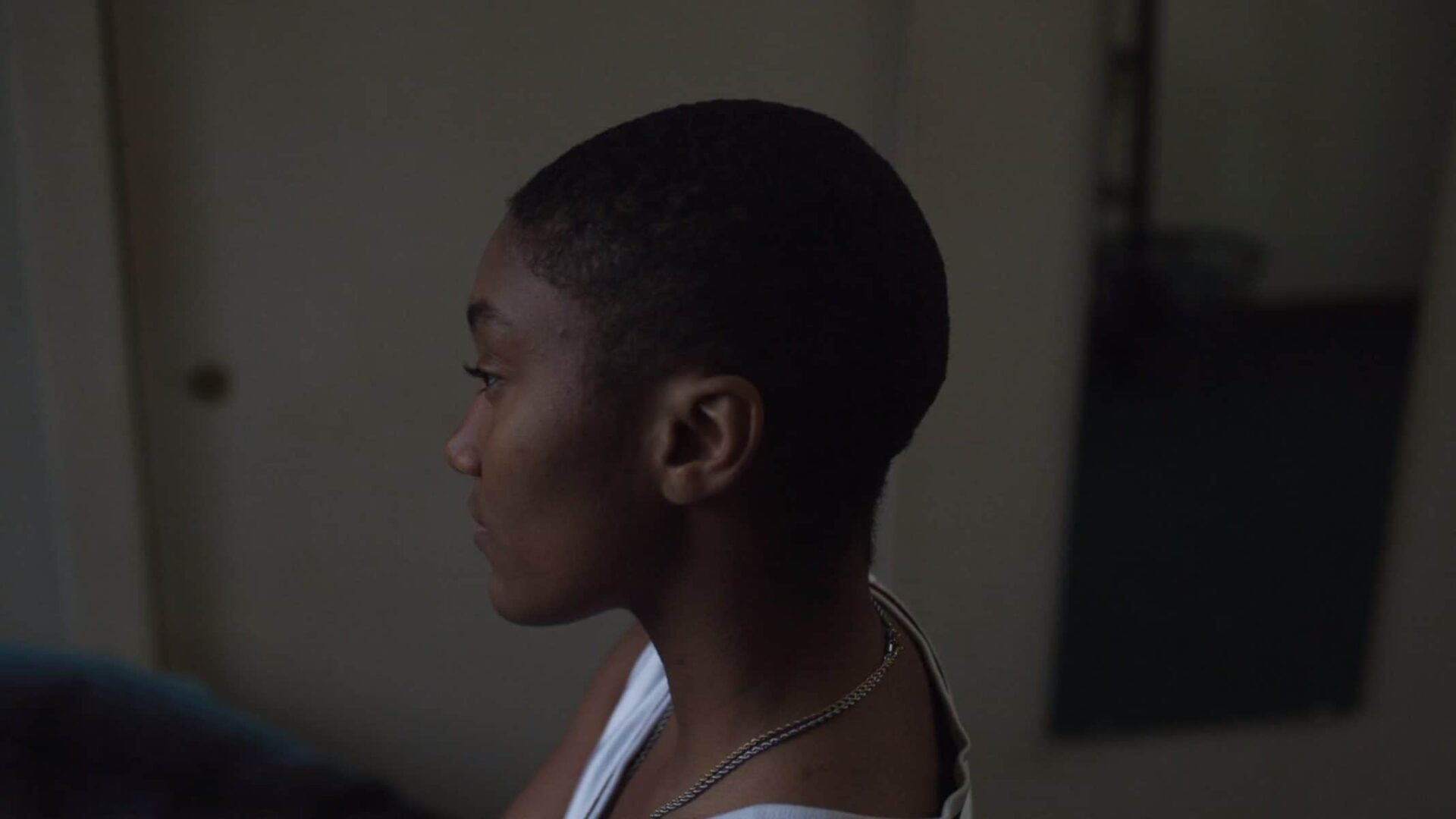 Caitlin's head from the side, after she cut her hair.