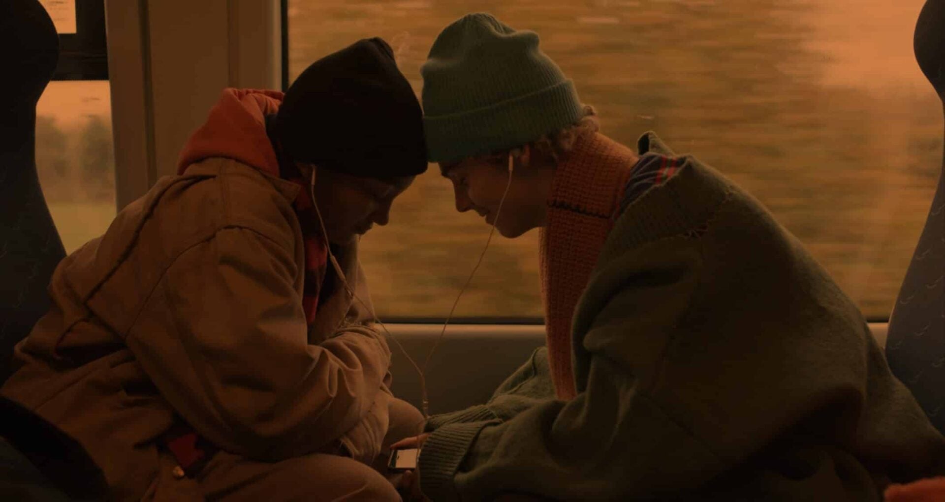 Caitlin and Fraser on a train to see Blood Orange