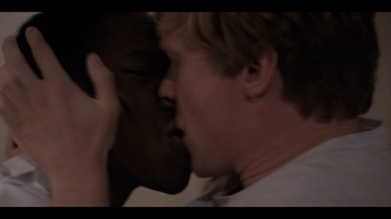 Gus and Theo kissing