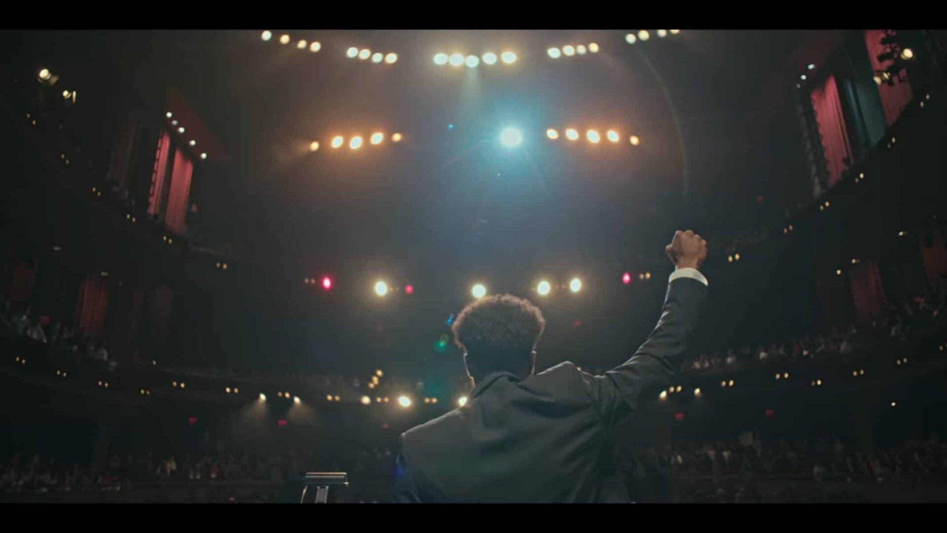 Jay giving a Black Power salute