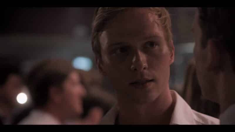 Theo (Will Tudor) in a party