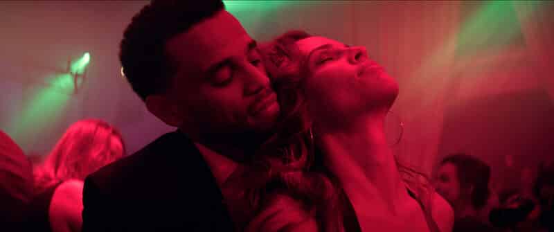 Derrick Tyler (Michael Ealy) and Detective Valerie Quinlan (Hilary Swank) dancing