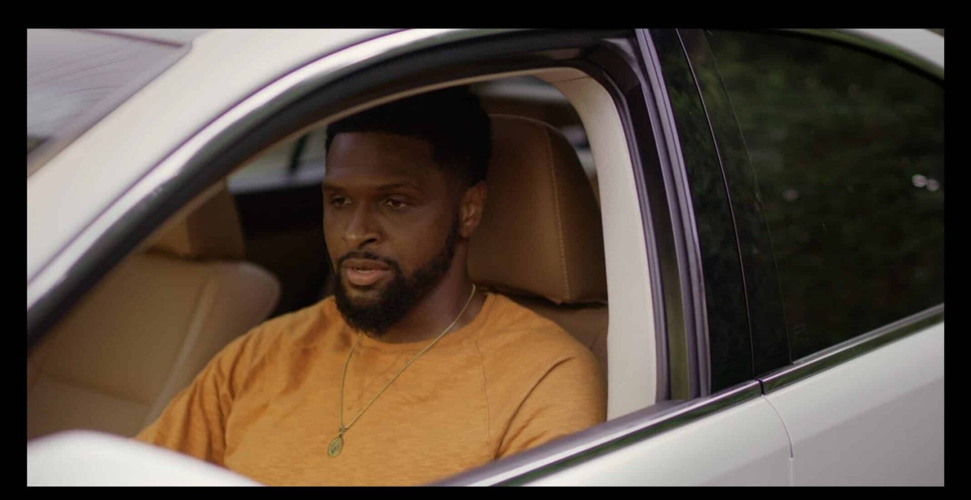 Jason sittin in his car