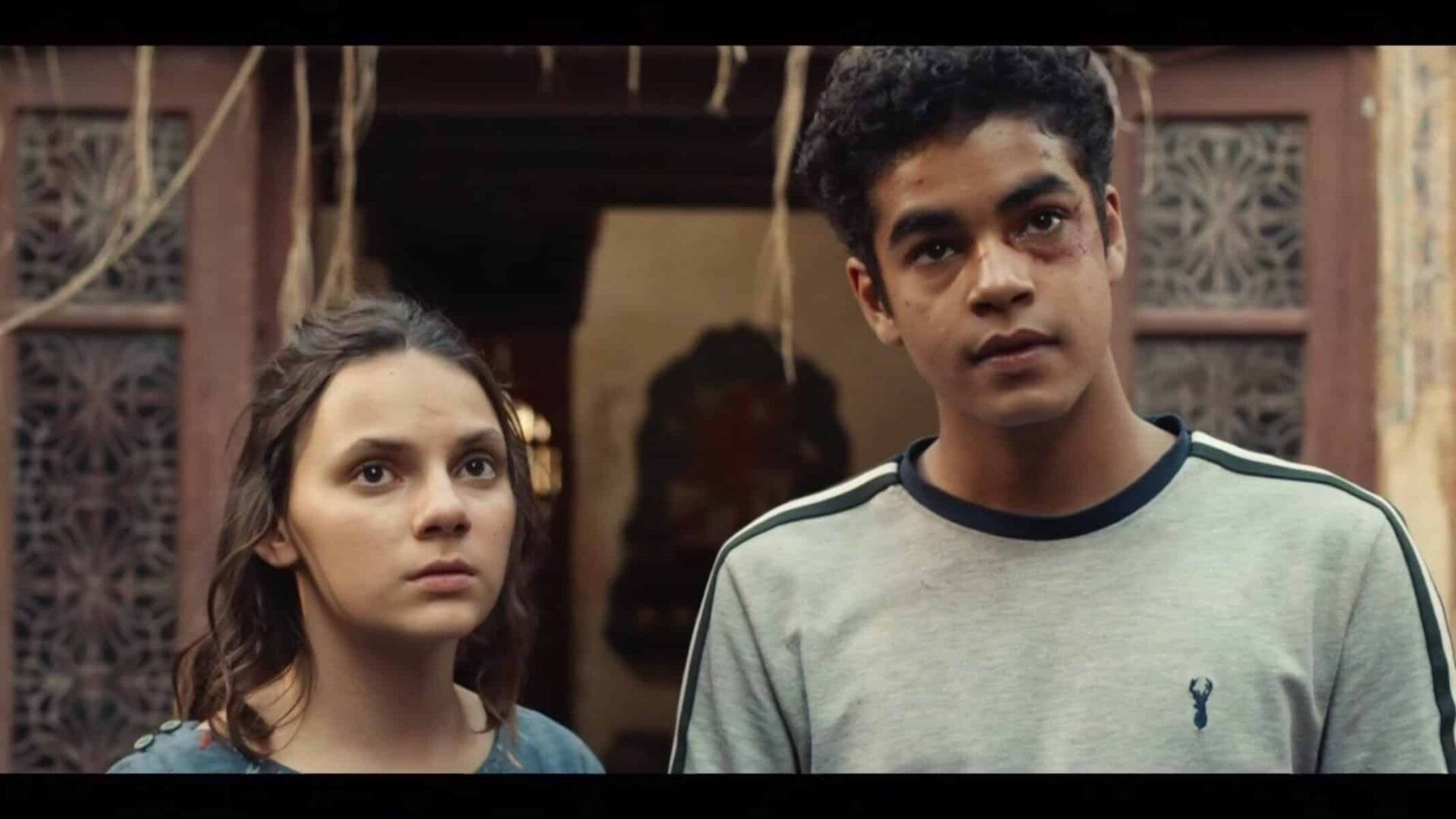 Lyra and Will looking forward
