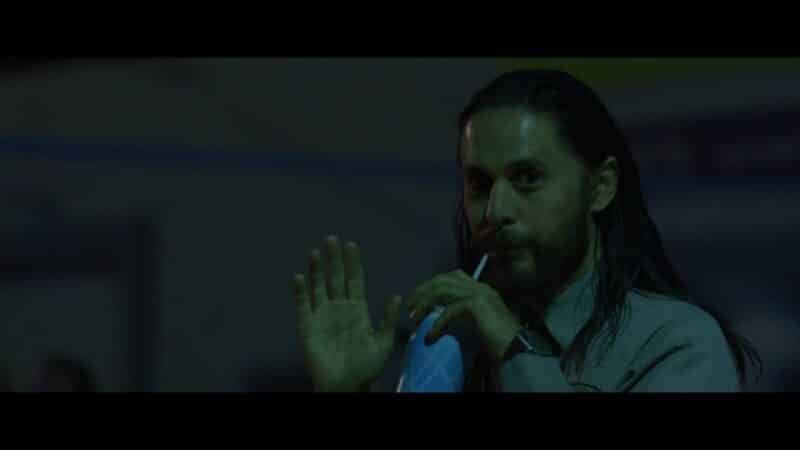 Albert (Jared Leto) waving