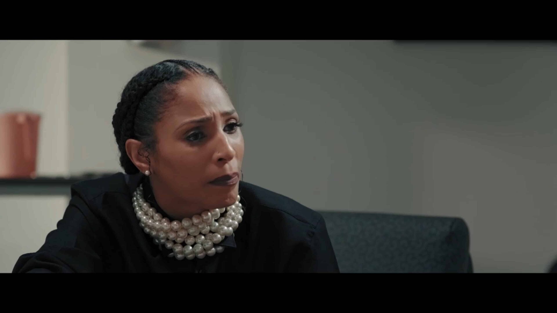 Tanya (Candice Van Beauty) talking to her husband, Detective Ryan