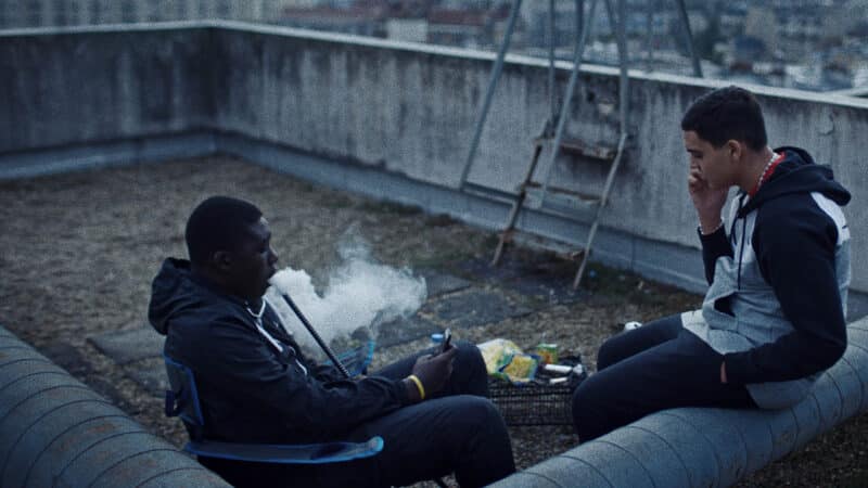 Aladi (Mouctar Diawara) and Ismael (Zakaria Lazab) hanging out on a roof