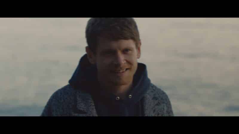 Jude (Jack O'Connell) smiling