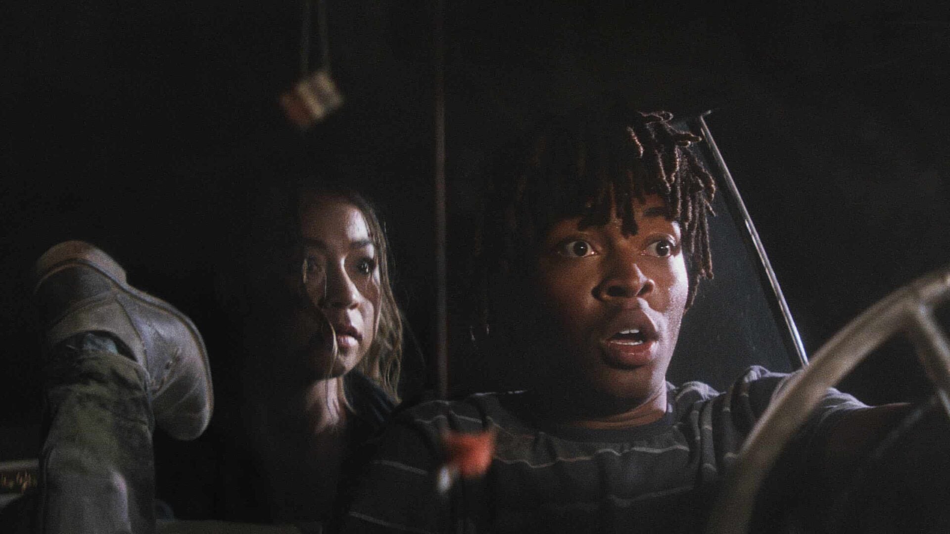 Kelsey (Shelby Duclos) and Mike (Tyson Brown) escaping a drug deal gone wrong