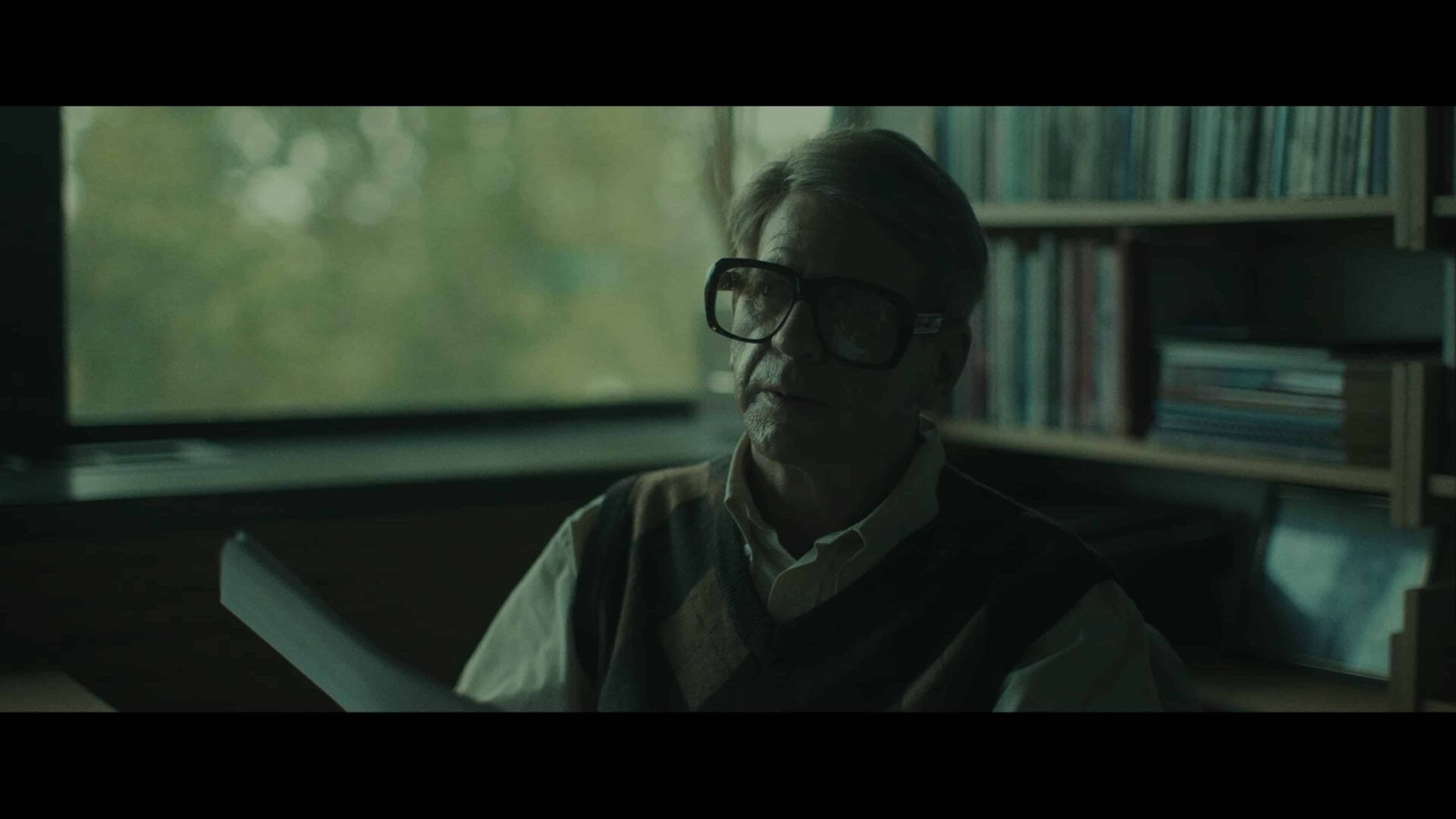 Dr. Meyer (Christopher Heatherington) in his office
