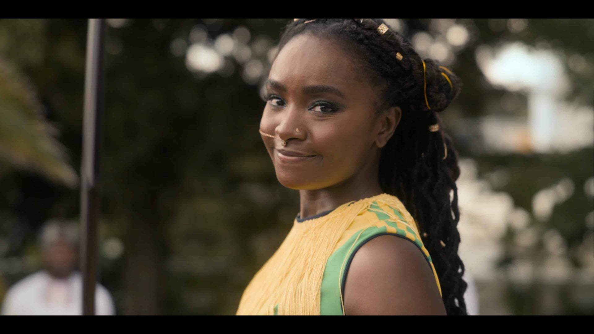 Meeka (KiKi Layne) looking over her shoulder