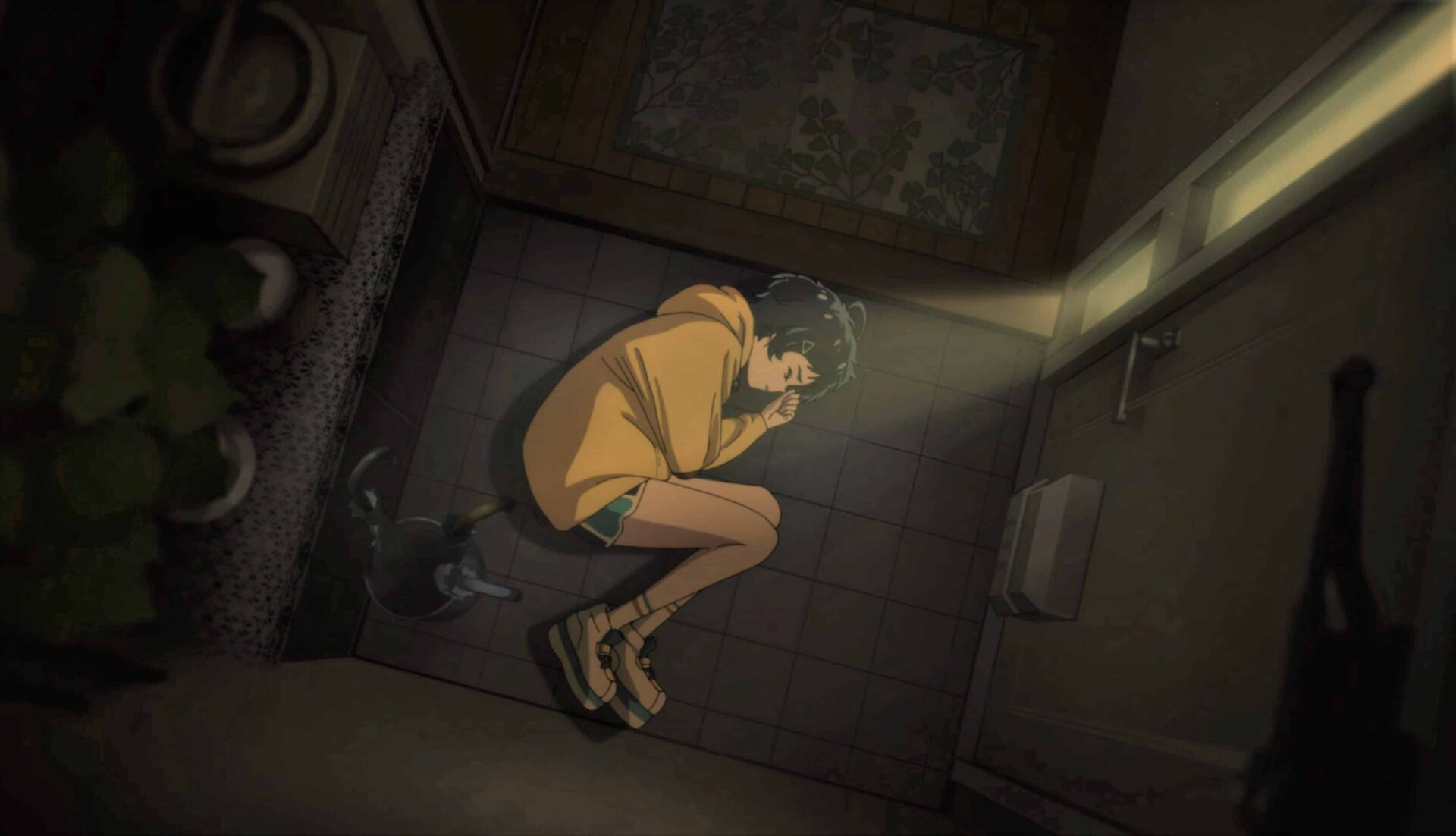Ai in the fetal position, in front of her front door