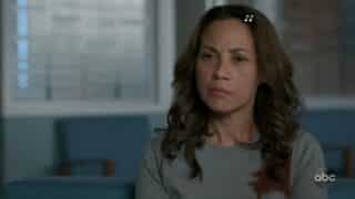 Carina (Elizabeth Rodriguez) waiting for an update on her son