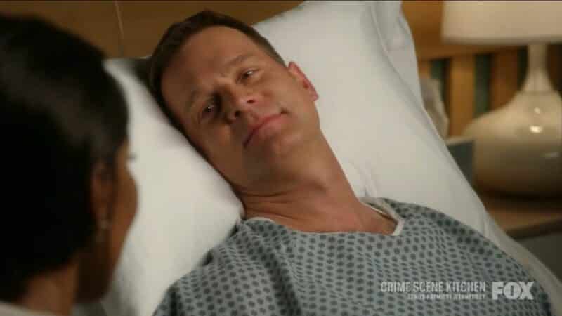 Bobby in a hospital bed with Athena, after he was shot