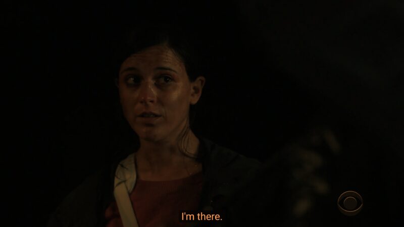 Carla (Alexandra Socha) noting she owes Robyn a favor and is there on command