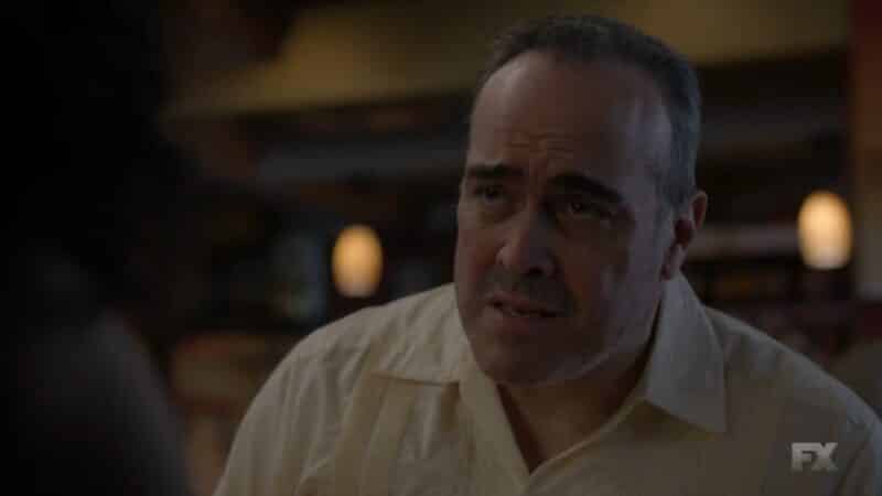 Carlos (David Zayas) talking to Angel