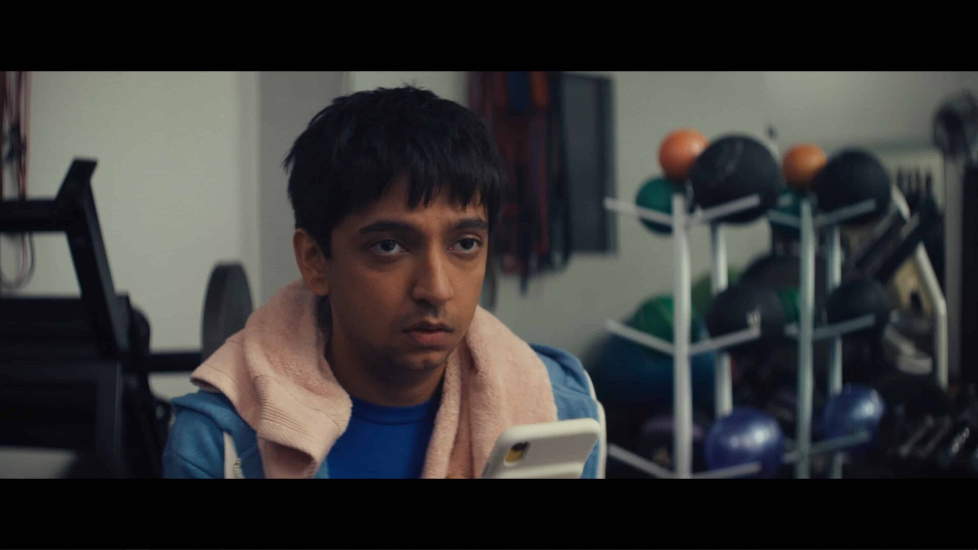 Kyle (Nik Dodani) at the gym