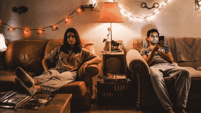 Rita (Geraldine Viswanathan) and Ravi (Karan Soni) sitting with each other