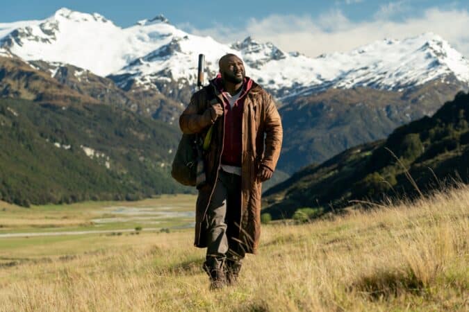 Tommy Jepperd (Nonso Anozie) in a field