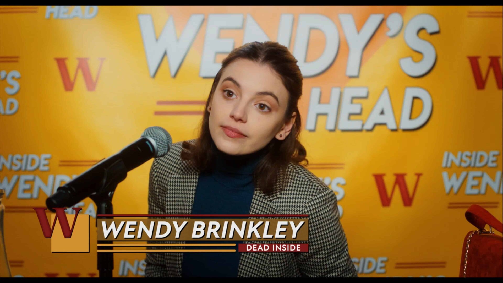 Wendy (Francesca Reale) in a post-date interview