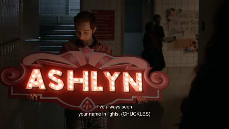 Big Red with a lit up sign that says "Ashlyn"
