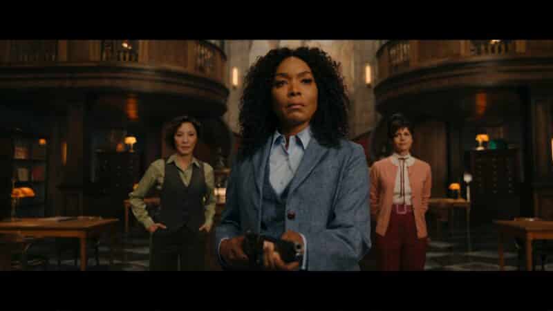 Florence (Michelle Yeoh), Anna May (Angela Bassett), and Madeleine (Carla Gugino) greeting uninvited guests