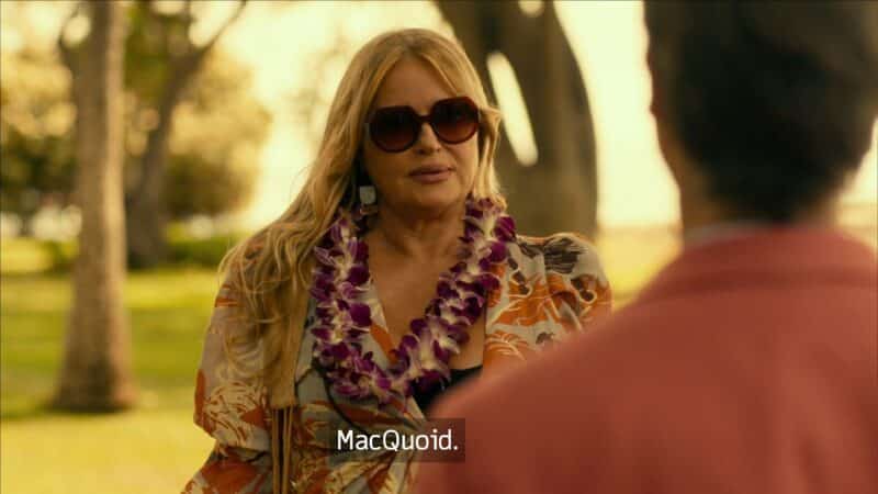 Tanya MacQuoid (Jennifer Coolidge) correcting the staff on how to say her name